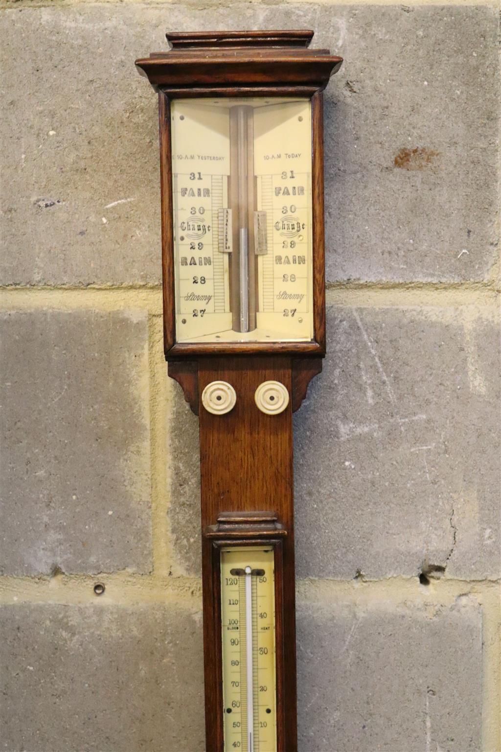 A Victorian oak stick barometer, height 98cm